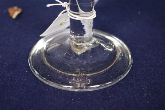 A wine glass, c.1740, with conical bowl over a plain stem, on a folded foot, 7.25in